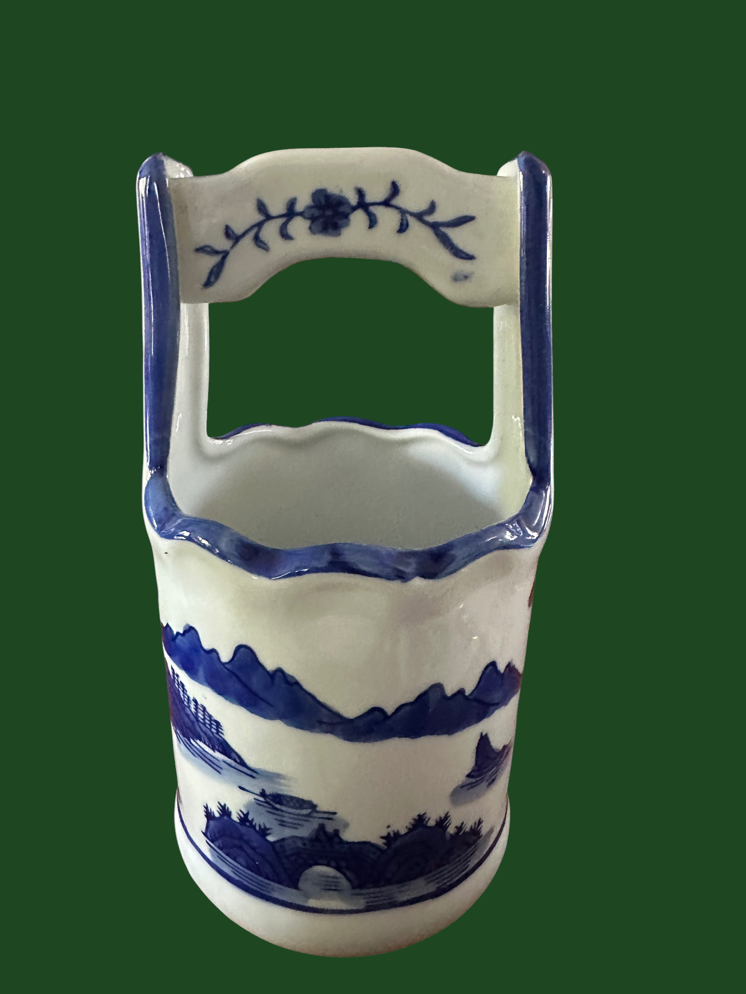 Blauw-witte keramische houder met handvat